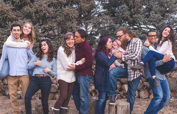 A photo of a family posing together