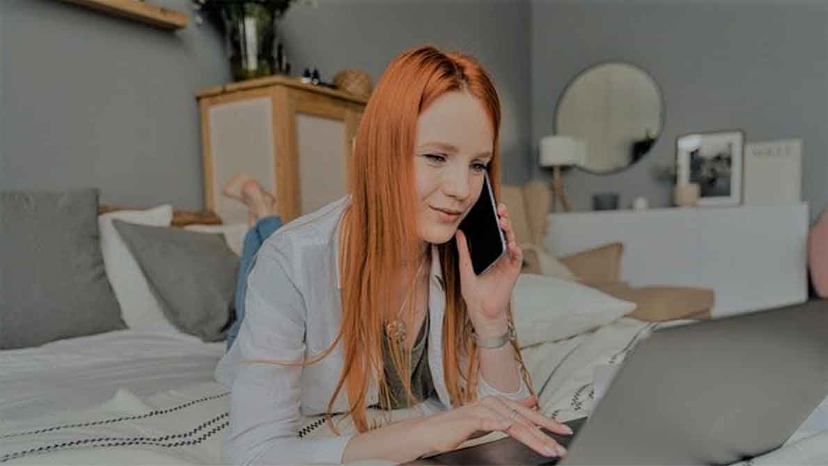 Redhead on a computer